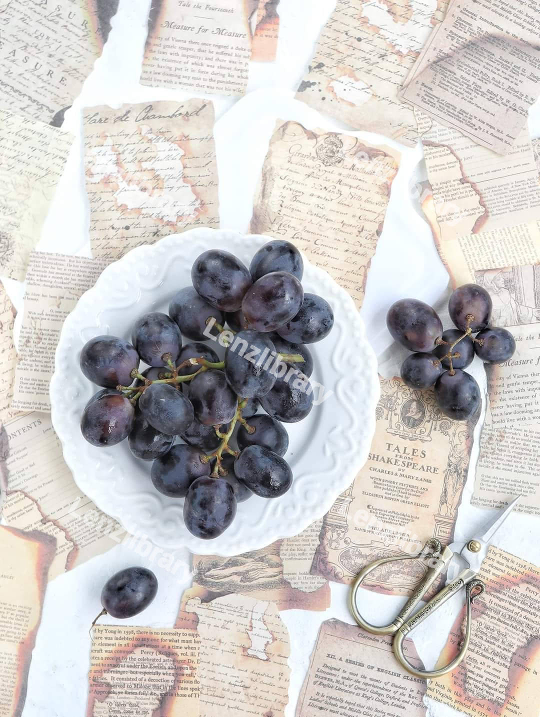 Fresh black grapes in a plate